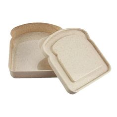 two pieces of white bread in a cardboard container on a white background with clipping for text