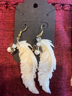 🌟 Embrace a touch of celestial elegance with our Angel Wing Earrings featuring a delicate Angel Charm! 🌟 ✨ Product Details: - Each pair of earrings is lovingly handcrafted with meticulous attention to detail. - These earrings feature graceful angel wings, each carrying a tiny angel charm that symbolizes protection, guidance, and serenity. - Crafted from high-quality materials, these earrings are more than just jewelry; they're a reminder of divine grace. 😇 Angelic Inspiration: These angel wing earrings are a beautiful representation of the heavenly presence in our lives. They serve as a reminder of the angels who watch over us, providing comfort and protection during life's journey. 👂 Comfort and Quality: We've designed these earrings for maximum comfort. They are lightweight and featu Angel Charm, Angel Earrings, Divine Grace, Angel Wing Earrings, Wing Earrings, Hypoallergenic Earrings, Angel Wings, Jewelry Earrings Dangle, Etsy Earrings