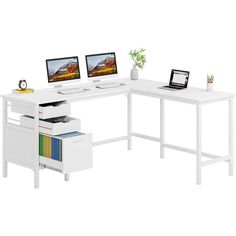 a computer desk with two computers on it