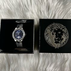 Got This As A Gift From My Husband But I Already Have Many Other Silver Watches. This Is Brand New. Never Worn Blue Stainless Steel Watch Accessory With Metal Dial, Elegant Blue Stainless Steel Watch Accessories, Luxury Blue Stainless Steel Watch Accessories, Blue Luxury Stainless Steel Watches, Luxury Blue Stainless Steel Watches, Elegant Blue Watch Accessories With Metal Dial, Blue Jewelry With Stainless Steel Clasp For Gift, Blue Stainless Steel Jewelry With Round Dial, Blue Stainless Steel Round Dial Jewelry