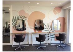 the salon is equipped with three chairs and mirrors