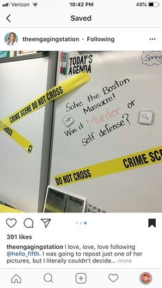 two whiteboards with yellow tape on them and some words taped to the wall behind them