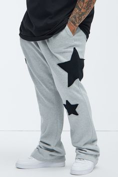 Available In Heather Grey. Elastic Waistband Drawstring Side Pockets Back Pockets Patch Details Disclaimer: Patch Placement May Vary. 80% Cotton 20% Polyester Imported | Mens Tyson Stars Skinny Flared Sweatpants in Heather Grey size Small by Fashion Nova Casual Star Print Bottoms For Streetwear, Cotton Bottoms With Star Print For Streetwear, Casual Cotton Bottoms With Star Print, Cotton Star Print Pants For Streetwear, Casual Star Print Loungewear Bottoms, Flared Sweatpants, Service Women, Mens Fleece, Grey Fashion