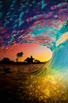 an image of the inside of a wave with stars and palm trees in the background