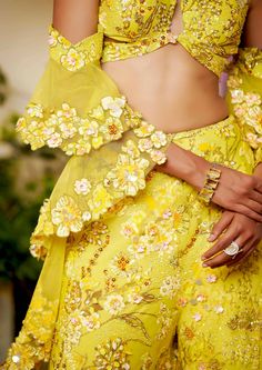 Like walking in a field of flowers where all the flowers bloom under the sun. The energy this co-ord set radiates is incomparable. The joy and comfort of the sun are presented in this set with utter glamour. The flared pants and a top in the shape of a butterfly are paired with a ruffle-sleeved dupatta which ties in the glamour and youth of the dress. Walking In A Field, A Field Of Flowers, Field Of Flowers, Flowers Bloom, Flared Pants, Co Ord Set, The Energy, Flower Field, A Butterfly