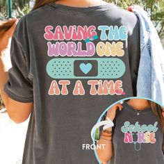 a woman wearing a t - shirt that says saving the world one at a time