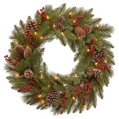 a christmas wreath with pine cones and red berries