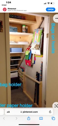 an open closet with shelves and paper folders on the bottom shelf, next to a pinter's note