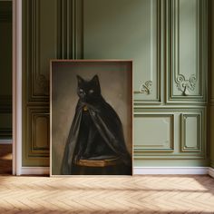 a black cat dressed in a cape and sitting on top of a table next to a painting