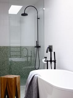 an image of a bathtub and shower in a bathroom