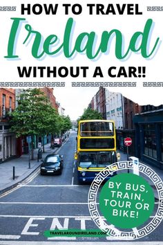 a bus driving down a street next to a green sign that says how to travel ireland without a car