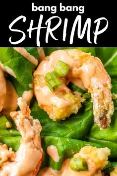 the shrimp is covered in sauce and garnished with green peppers, on top of spinach leaves