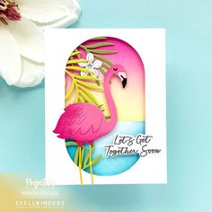 a card with a pink flamingo on it