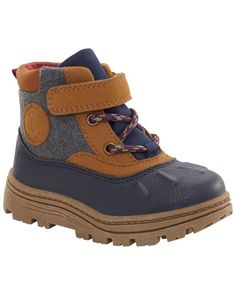 Marshmallows, and mittens, and more leaf piles, quick! Things can get a little campy in our Carter’s New Boots. From the cozy contrast fabric to their durable puddle-splashing outsoles, these cool-weather kid’s boots are essential for anything outdoorsy. An easy hook-and-loop closure ensures speedy Toddler Duck Boots, Boy Boots, Duck Boot, Carters Baby Boys, Toddler Boy Shoes, Free Shoes, Carters Baby, Boys Boots, Navy And Brown