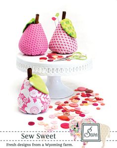 the sewing pattern is for two stuffed pears on a cake platter with buttons and sew - sweet designs from a wyoming farm