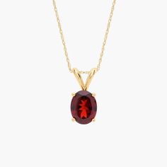 This gleaming pendant necklace showcases an oval cut garnet set in 14k gold. Handcrafted details and a high-quality garnet make this pendant easy to style. Wear it on its own or layer it with additional necklaces for a trendy look. Precious Gemstones Jewelry, Garnet Pendant, Semi Precious Gemstones, Spring Rings, Gemstone Necklace, Wear It, Oval Cut, Birthstone, Garnet