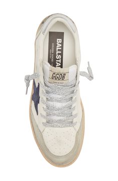 Glittery laces accentuate the signature scuffed-up details of a low-top sneaker complete with the label's iconic star patch. Lace-up style Textile and leather upper and lining/rubber sole Made in Italy Women's Designer Shoes Navy Blue Golden Goose, Navy Golden Goose, Golden Goose Ball Star Outfit, White Everyday Sneakers, Off White Shoes Women, Cool Shoes Women, Sneakers For Women 2023, Golden Goose High Tops, Golden Goose Women