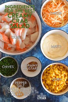 ingredients for the best creamy crab salad in bowls on a blue background with text overlay