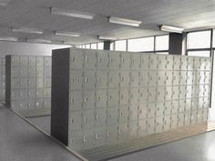 two rows of lockers in an empty room