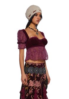 Start the story with this top that has a sheer lace construction, a velvet bustier with an underwire bust, a decorative bow, puffy sleeves with bows, a lettuce trim, and a back zipper closure. Velvet Party Corset, Party Tops With Lace Trim And Underbust Shape, Ruffled Fitted Bodice Tops For Party, Ruffled Tops With Fitted Bodice For Parties, Fitted Lace Top With Puff Sleeves, Party Lace Tops With Boned Bodice, Whimsigoth Outfits, Current Mood Clothing, Velvet Bustier