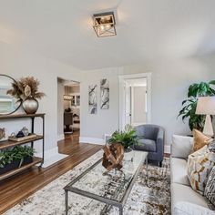 a living room filled with furniture and decor