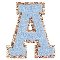 the letters are made out of blue and gold glitters