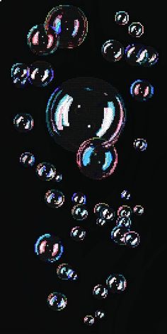 an image of bubbles floating in the air on a cell phone screen with black background