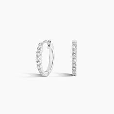 Diamond Hoop Ears - 14K White Gold. These diamond hoop earrings are simple yet sophisticated and add the perfect amount of sparkle to any chic ear stack (1/10 total carat weight). Gold Diamond Hoop Earrings, Simple Diamonds, Ear Stack, Diamond Hoop Earrings, Accessories Jewelry Earrings, Eternity Ring, White Gold Diamonds, Quality Jewelry, Gold Diamond