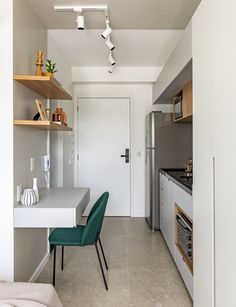 the kitchen is clean and ready to be used as a dining room or living room