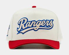 the rangers hat is white and red with blue lettering on it, along with an orange brimmed visor