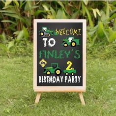 a chalkboard sign that says welcome to finney's 2nd birthday party on it