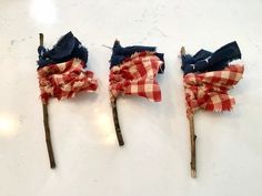 three red, white and blue hair pins with bows