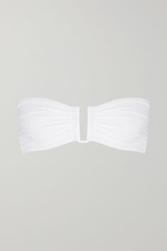 Eres' flattering bikini top is cut from the label's innovative, sculpting  peau douce  fabric. The white hue offsets sun-kissed skin elegantly.  Wear it with: [Eres Bikini briefs id1107790], [Gucci Sunglasses id1118628]. Vacation Bandeau Tube Top With Built-in Bra, Seamless Triangle Tube Top For Beachwear, Seamless Bandeau Tube Top For Summer, Seamless Strapless Tube Top For Beachwear, Stretch Bandeau Tube Top For Vacation, Seamless Triangle Tube Top For Poolside, Summer Seamless Triangle Tube Top, Bandeau Swimwear Bra Friendly For Summer, Bandeau Swimwear With Bra Friendly Design For Summer