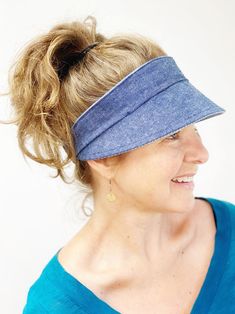 Sun Visor for Women Sizes Large or SmallFloral cotton with dark blue denim on reverseReady to ship in 2-3 business daysAdjustable back hook and loop closure OVERVIEWNot only is this sun visor adjustable it also can protect you from the shade, oh, and it’s reversible! Perfect for farmers market, walking, running and especially great for gardening and ball games. Keep your face and ears shaded with this lightweight visor. SMALL vs. LARGE BRIM✂Small brim measures 20 inches around and the depth is 2 Summer Visor, Summer Beanie, Golf Visor, Womens Visor, Ball Games, Floppy Hats, Summer Hats For Women, Stretch Headband, Sun Hats For Women