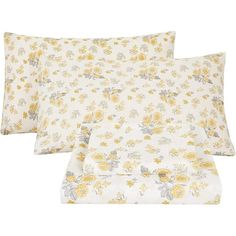 three pillow cases with yellow flowers on them