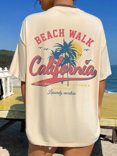 This t-shirt only has a design printed on the back, there is no front design. Channel Retro Vibes with this Beach Walk California Tee Hit the beach in style with this ultra-comfortable women's t-shirt featuring a cool, vintage-inspired design. The back of the shirt boasts a laid-back "Beach Walk California" message in a retro font, perfect for capturing the essence of classic California cool. This tee is sure to become your go-to for sunny days, coastal adventures, or whenever you want to bring Plus Jumpsuit, Maxi Dress Cocktail, Curvy Jeans, Maxi Dress Formal, Beach Walk, Basic Style, Half Sleeve, 8 M, Bra Tops