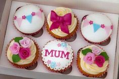 six cupcakes in a box with the word mum on them