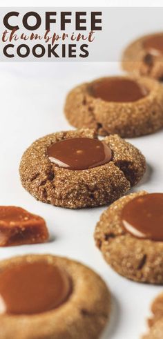 some cookies with peanut butter on them and the words coffee chocolate thumbprint cookies above them