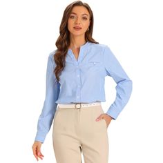 Crafted with soft fabric, this blouse strikes the ideal balance between comfort and style, ensuring that you look polished and put-together throughout the day. The V-neckline adds a feminine touch, while the button-down front offers a timeless and professional look. This versatile blouse features a classic striped pattern and long sleeves, making it the perfect choice for any workplace setting, exuding professionalism and elegance. Blue V-neck Blouse For Office Wear, V-neck Office Lady Shirt For Office Wear, V-neck Workwear Top With Placket, Office Wear V-neck Shirt For Ladies, Office Lady V-neck Shirt For Office Wear, Office Lady V-neck Shirt, Blue Office Blouse With Placket, Spring V-neck Business Casual Shirt, Blue V-neck Office Blouse