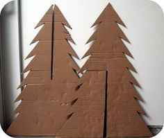 cardboard christmas trees cut out of brown paper