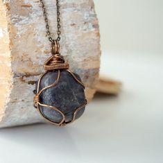 Nature-inspired Raw Stone Jewelry For Healing, Nature-inspired Raw Stone Healing Jewelry, Handmade Kyanite Healing Necklaces, Bohemian Sodalite Necklace As Gift, Handmade Sodalite Healing Necklace, Holistic Necklace With Raw Stone For Gift, Sapphire Pendant Necklace For Healing, Sapphire Crystal Necklace With Natural Stones As Gift, Sapphire Crystal Necklace With Natural Stones For Gift