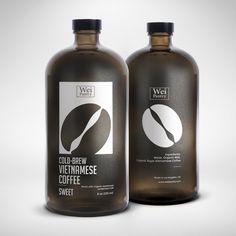 two bottles of cold - brewed coffee sit side by side on a white background