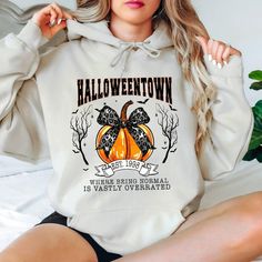 Halloweentown Hoodie, Halloween Hoodie Gift for Women,Fall Hoodie,Spooky Season,Retro Halloween Pumpkin Hoodie,Halloween is My Happy Place This hoodie is suitable for children under 14 years old. The drawstrings are closed to prevent the risk of strangulation Hi! Welcome to the 💍 Lord Of The Shirt 💍 store.  We offer a wide range of unique designs tailored specifically for you. Please take a look at the other products in my shop! Our hoodies are made of a thick cotton and polyester blend that provides both comfort and style. There are no side seams and the air-jet yarn ensures a softer feel and less pilling. Plus, our hoodies have double needle stitching on the shoulders, armhole, neck, waistband and cuffs. If you prefer a comfortable fit, we recommend increasing the size by one. If you p Halloween Long Sleeve Sweatshirt With Drawstring Hood, Halloween Hooded Hoodie With Letter Print, Spooky Fall Streetwear Hoodie, Spooky Hooded Sweatshirt For Fall, Halloween Hooded Sweatshirt With Letter Print, Halloween Hooded Spooky Sweatshirt, Spooky Hooded Halloween Sweatshirt, Hooded Halloween Sweatshirt With Letter Print, Hooded Spooky Halloween Sweatshirt