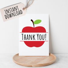 an apple card with the words thank you on it and a tag attached to it