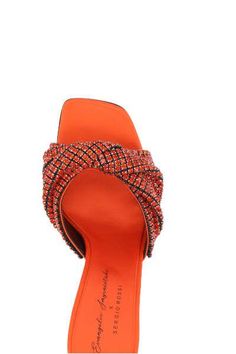 Sergio Rossi's mule sandals designed in collaboration with Evangelie Smyrniotaki and crafted in orange satin embellished by tone-on-tone crystals. Featuring a slightly square-toe silhouette, leather / fabric lining and leather sole. The design is completed by a satin-covered stiletto heel.Gender: WomenMaterial: 100% FABRIC, 100% SILK, 55% FABRIC, 100% SILK, 45% KID LINING, 100% LEATHERColor: MANDARINE+NYKEL+HYACINTHMade in: ITProduct ID: B01280MFI6256547*Import tax/duty will be calculated at che Summer High-heel Mules With Rhinestones, Summer High Heel Mules With Rhinestones, Luxury Summer Mules With Rhinestones, Summer Rhinestone High Heel Mules, Luxury Rhinestone Mules For Summer, Luxury Rhinestone Summer Mules, Luxury Summer Rhinestone Mules, Summer Evening Mules With Rhinestones, Summer Formal Mules With Rhinestones