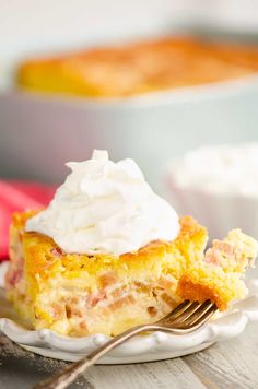 a slice of easy rhubarb custard cake on a white plate