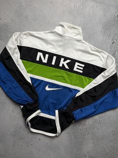 Nike Vintage Zipper Jacket central swoosh logo y2k 90s Size Men's / US L / EU 52-54 / 3 Color Multi Condition Gently Used Nike Vintage central logo central swoosh crewneck 80s 90s 00s retro spellout y2k sweatshirt centre swoosh big logo. The material is pleasant to the body. In a good condition. Fast sending! Condition : 8/10 Chest - 62 cm Length - 65 cm Shoulders - 56 cm Sleeve Length - 57 cm - ALL ITEMS ARE HEAT TREATED AND WASHED BEFORE SHIPPING - FOLLOW MY STORE - SEE MY OTHER ITEMS Nike Vintage Hoodie, Central Logo, Logo Y2k, Y2k Sweatshirt, Nike Vintage, Men's Casual Style, Sweatshirt Zipper, Swoosh Logo, Vintage Hoodies