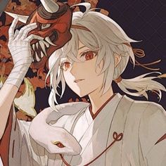 an anime character with white hair wearing a mask and holding a snake in his hand