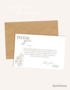 a thank card with the words, thank you on it and an envelope that says