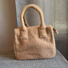 Nwt J. Crew Factory Structured Sherpa Tote Bag, Desert Brown Polyester. Interior Pocket. 9"H X 10 1/2"W; 5 3/4" Handle Drop. Casual Winter Satchel In Rectangular Shape, Casual Rectangular Satchel For Winter, Beige Shoulder Bag For Daily Winter Use, Rectangular Satchel For Everyday Winter Use, Everyday Rectangular Satchel For Winter, Everyday Winter Rectangular Satchel, Everyday Rectangular Winter Satchel, Beige Bag For Daily Use In Winter, Winter Shopping Bag In Cream Color